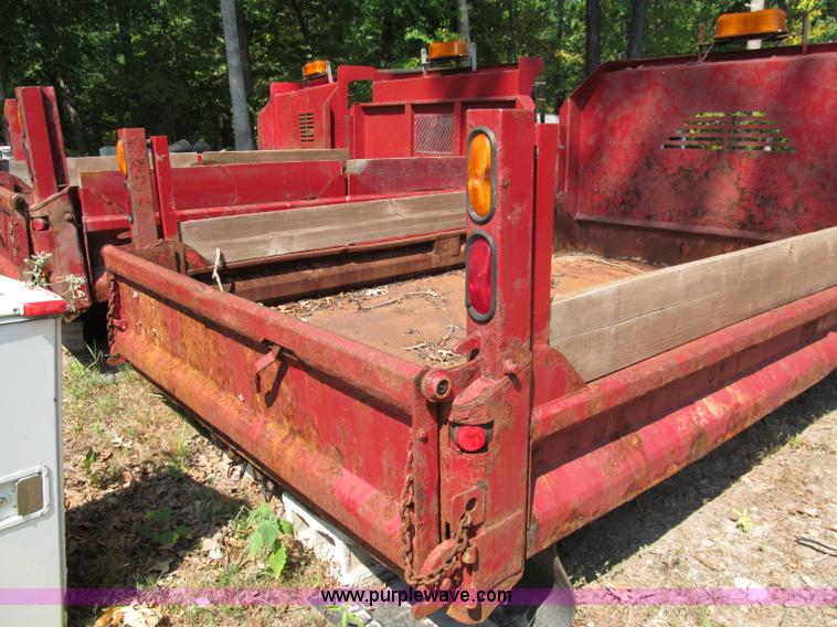 image for item E2086 11'L x 8'W dump bed with hoist