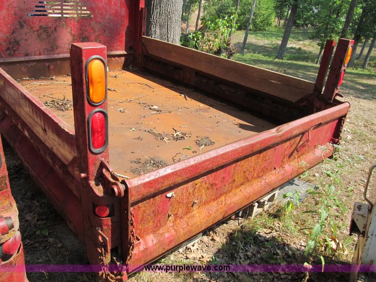 image for item E2086 11'L x 8'W dump bed with hoist