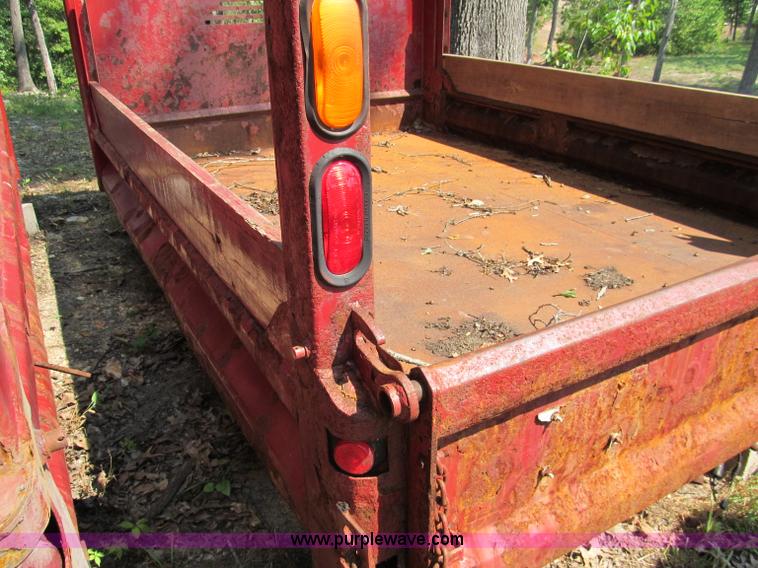 image for item E2086 11'L x 8'W dump bed with hoist