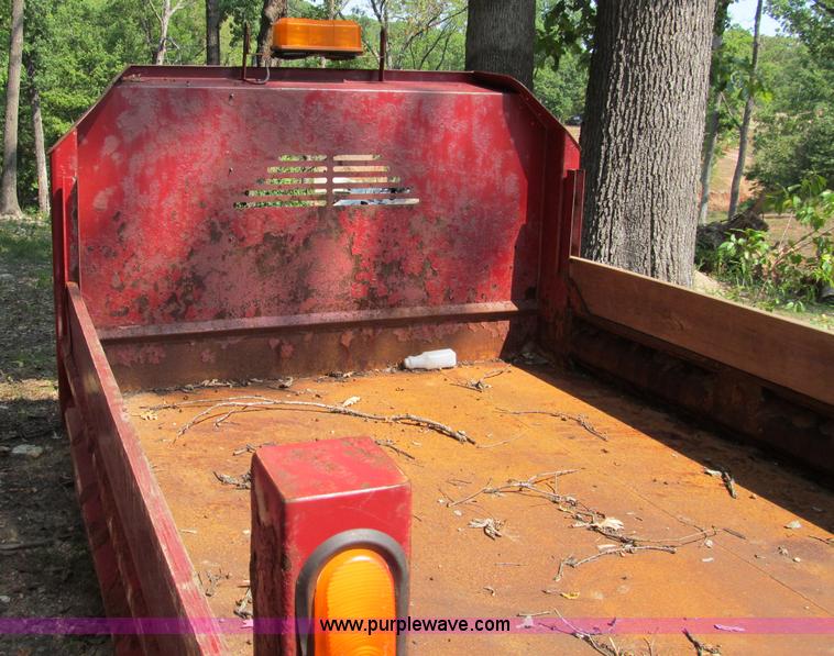 image for item E2086 11'L x 8'W dump bed with hoist