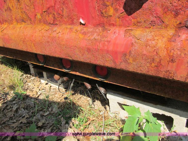 image for item E2086 11'L x 8'W dump bed with hoist