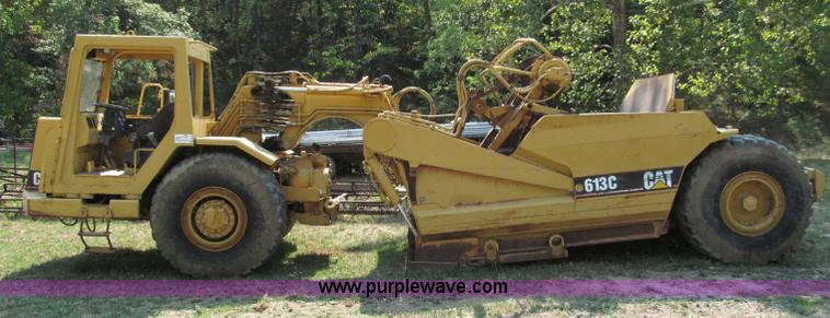 image for item E2089 1994 Caterpillar 613C Series II paddle scraper