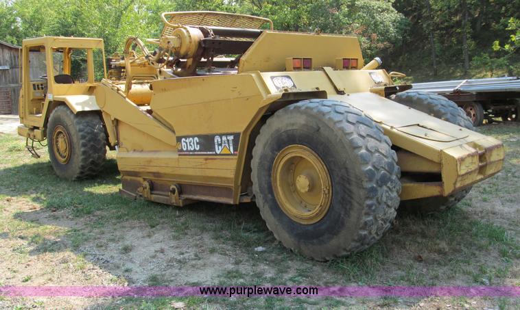 image for item E2089 1994 Caterpillar 613C Series II paddle scraper