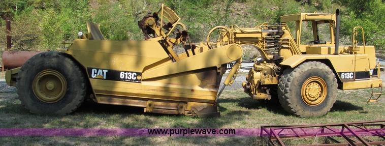image for item E2089 1994 Caterpillar 613C Series II paddle scraper