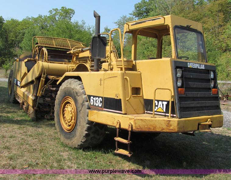 image for item E2089 1994 Caterpillar 613C Series II paddle scraper
