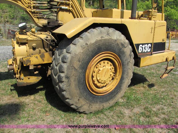 image for item E2089 1994 Caterpillar 613C Series II paddle scraper