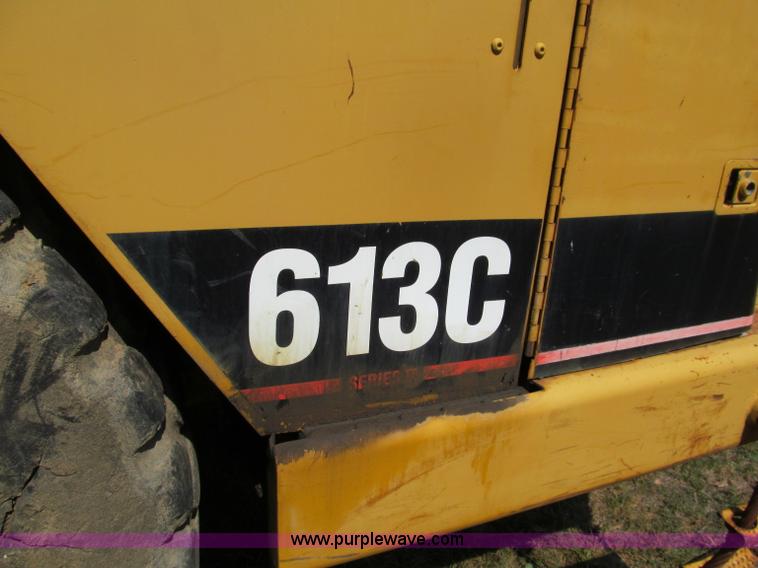 image for item E2089 1994 Caterpillar 613C Series II paddle scraper
