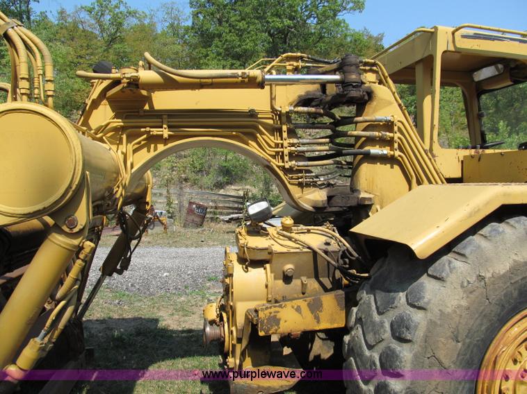 image for item E2089 1994 Caterpillar 613C Series II paddle scraper