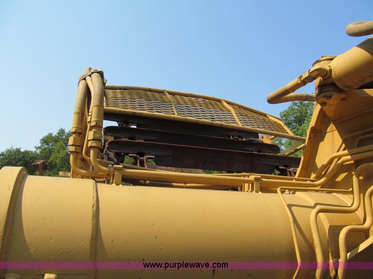 image for item E2089 1994 Caterpillar 613C Series II paddle scraper