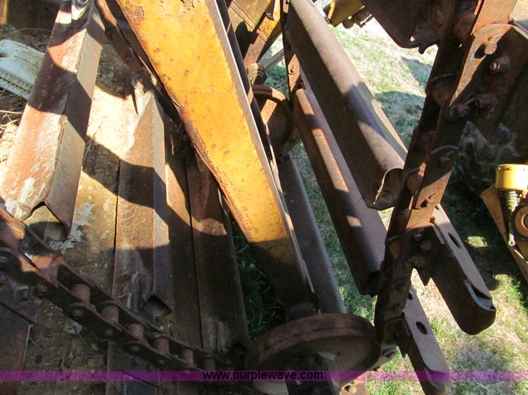 image for item E2089 1994 Caterpillar 613C Series II paddle scraper