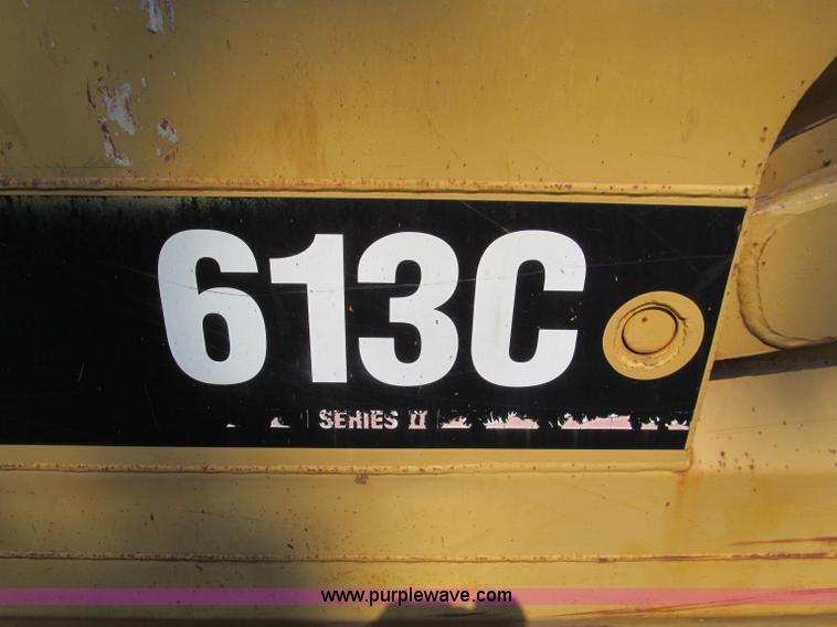 image for item E2089 1994 Caterpillar 613C Series II paddle scraper