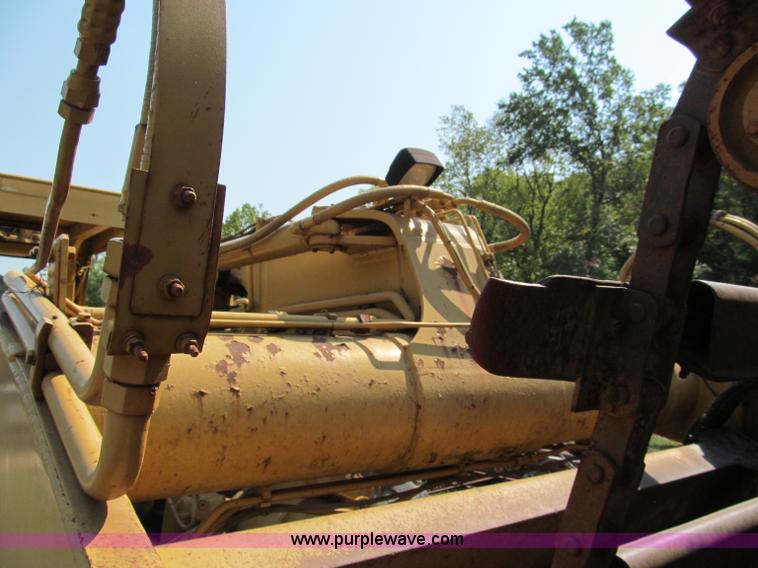 image for item E2089 1994 Caterpillar 613C Series II paddle scraper