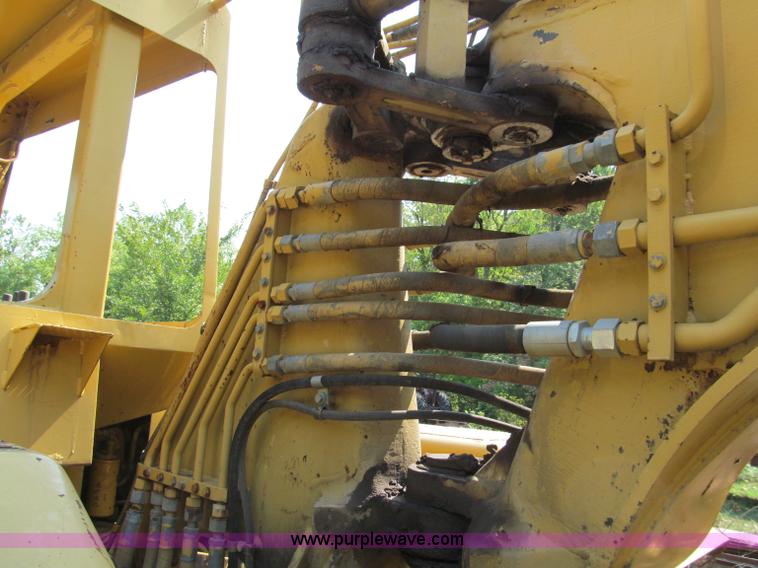 image for item E2089 1994 Caterpillar 613C Series II paddle scraper