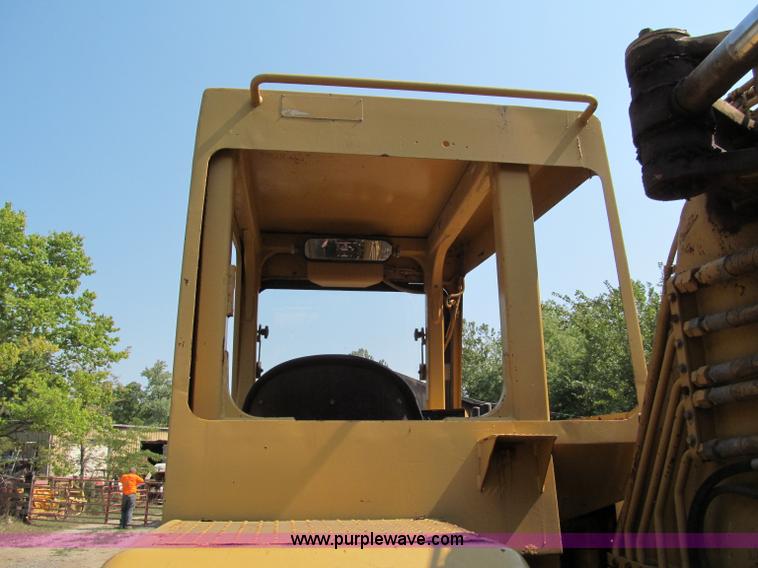 image for item E2089 1994 Caterpillar 613C Series II paddle scraper