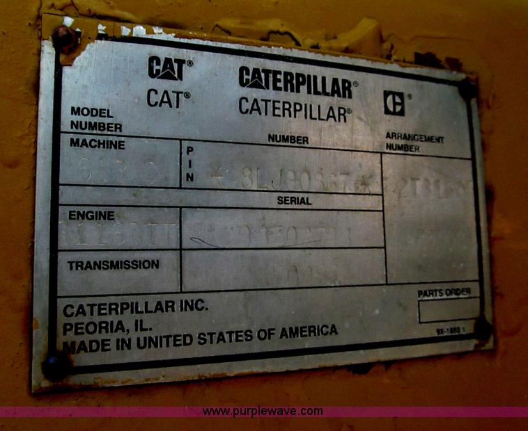 image for item E2089 1994 Caterpillar 613C Series II paddle scraper