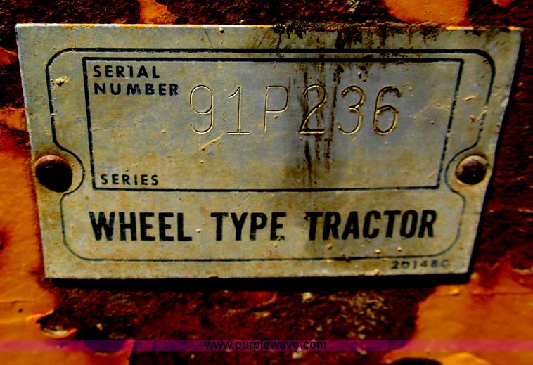 image for item E2090 1971 Caterpillar 815 articulating dirt compactor