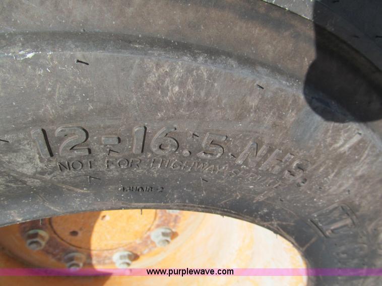 image for item E2122 2003 Case 60XT skid steer