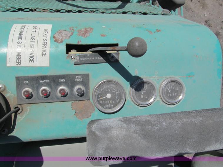 image for item E2137 Multiquip Whiteman 10' ride-on power trowel