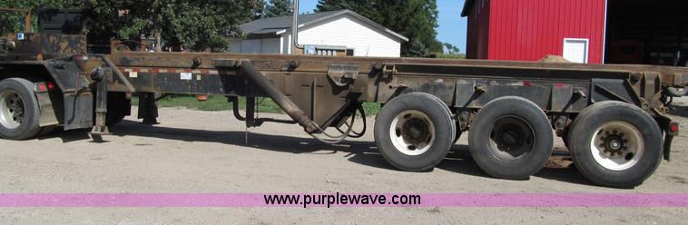 image for item F5511 1985 Galbreath TL roll-off triple axle trailer