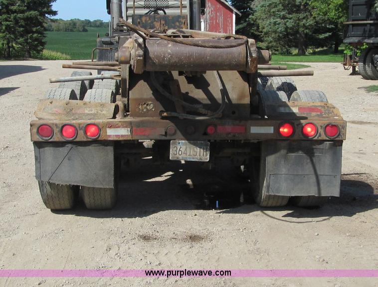 image for item F5511 1985 Galbreath TL roll-off triple axle trailer