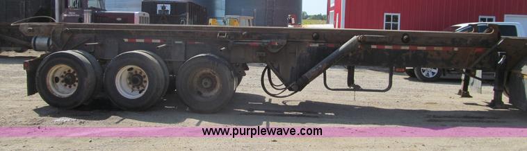 image for item F5511 1985 Galbreath TL roll-off triple axle trailer