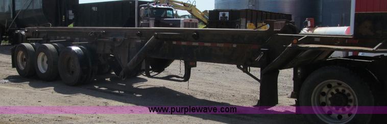 image for item F5511 1985 Galbreath TL roll-off triple axle trailer