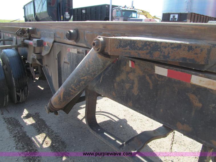 image for item F5511 1985 Galbreath TL roll-off triple axle trailer