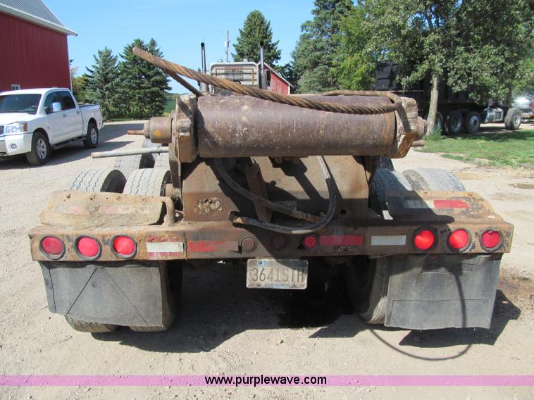 image for item F5511 1985 Galbreath TL roll-off triple axle trailer