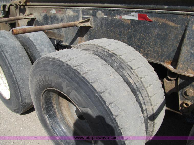 image for item F5511 1985 Galbreath TL roll-off triple axle trailer