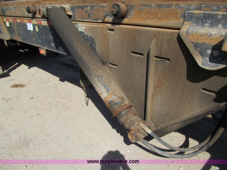 image for item F5511 1985 Galbreath TL roll-off triple axle trailer