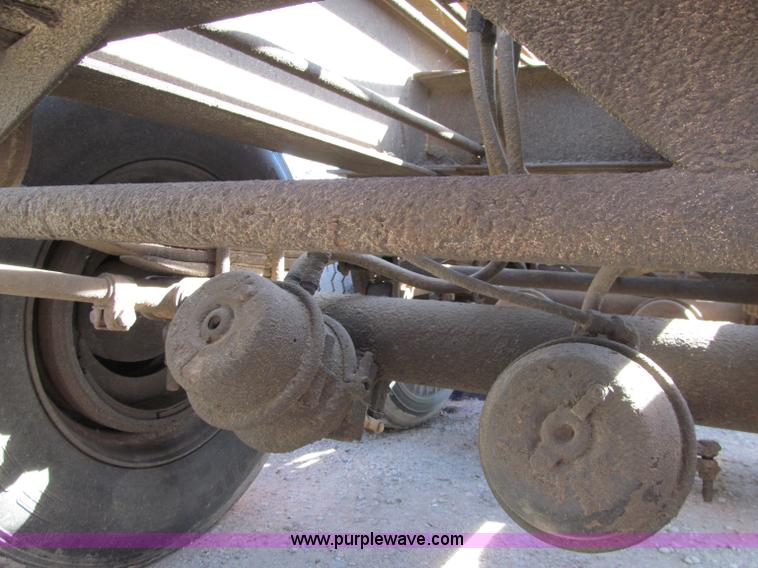 image for item F5511 1985 Galbreath TL roll-off triple axle trailer