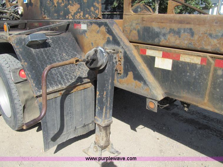 image for item F5511 1985 Galbreath TL roll-off triple axle trailer