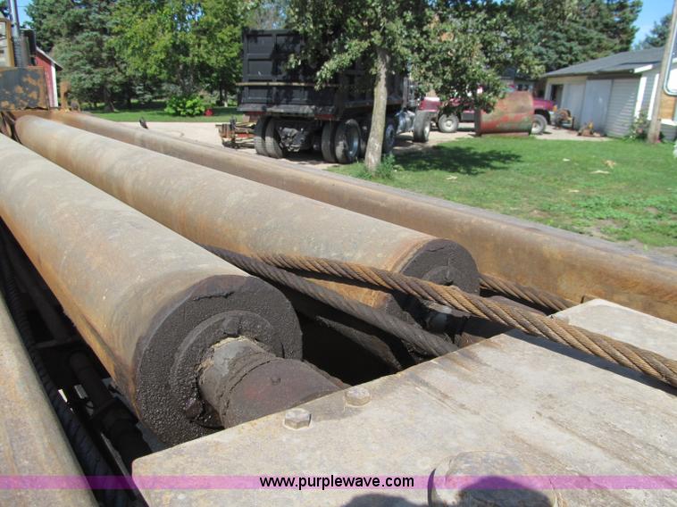 image for item F5511 1985 Galbreath TL roll-off triple axle trailer