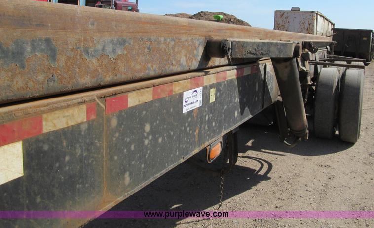 image for item F5511 1985 Galbreath TL roll-off triple axle trailer