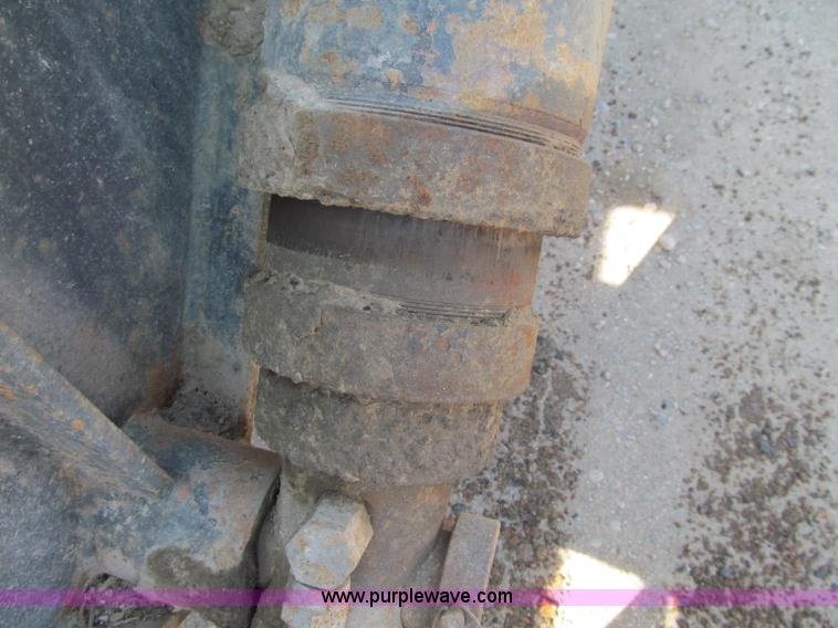 image for item F5511 1985 Galbreath TL roll-off triple axle trailer