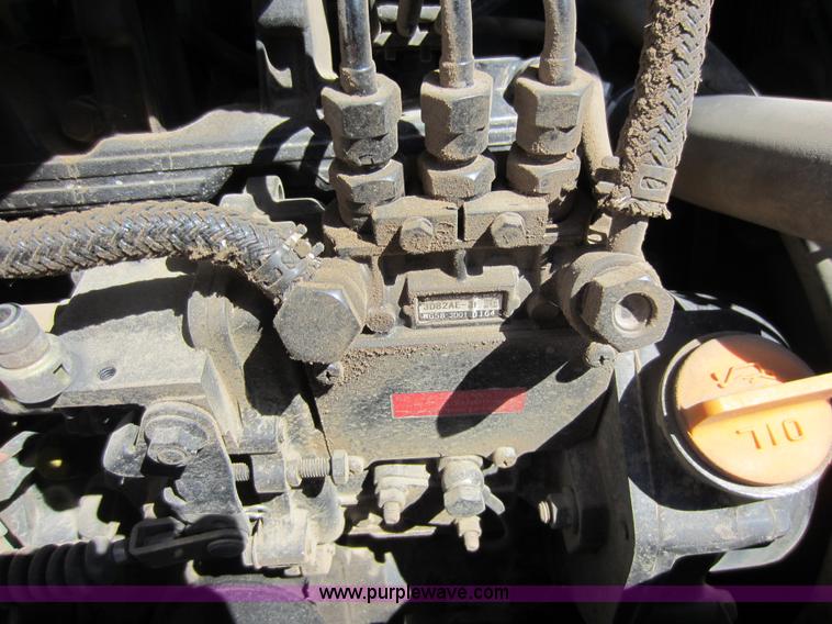 image for item F6516 2003 Ditch Witch MX27 mini excavator