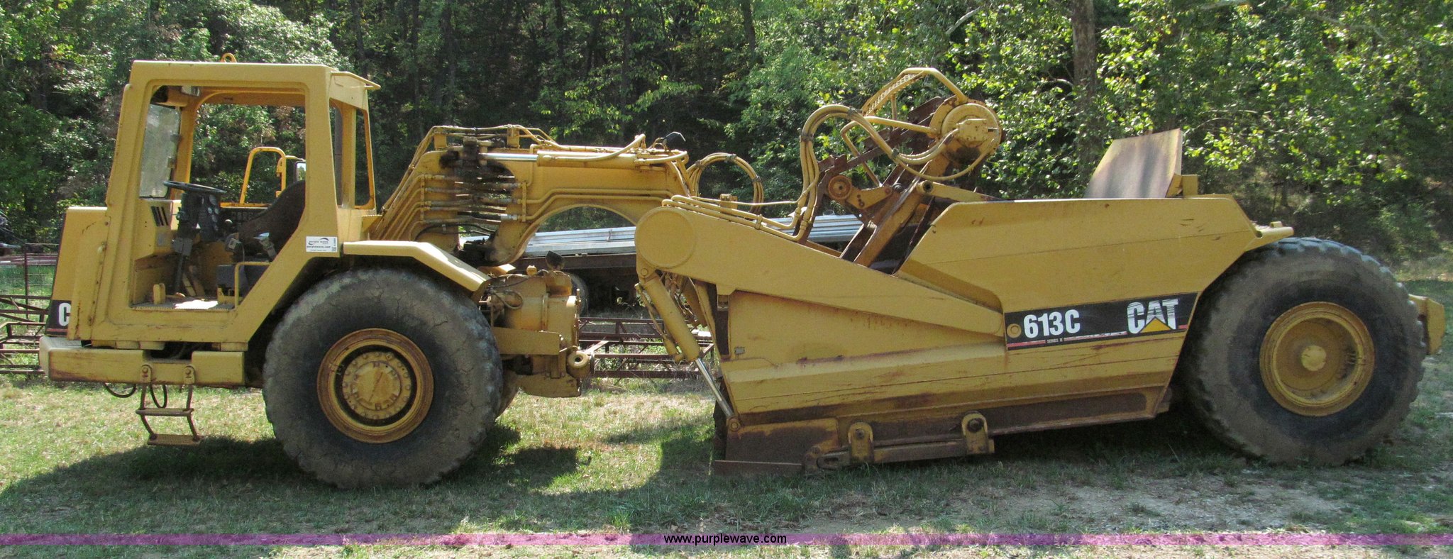 1994 Caterpillar 613C Series II paddle scraper in Smithville, MO Item
