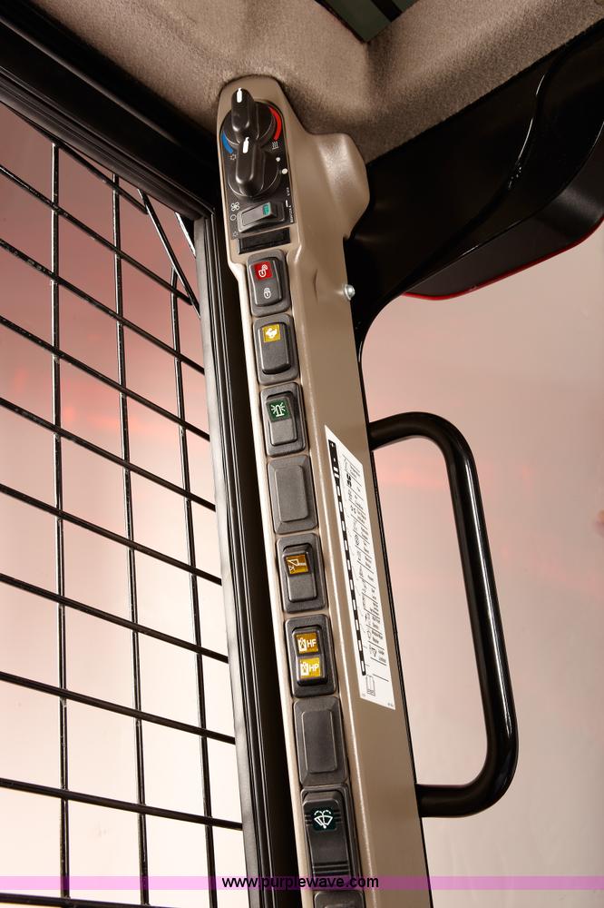 image for item B1474 2011 Case IH SV250 "RED POWER" skid steer