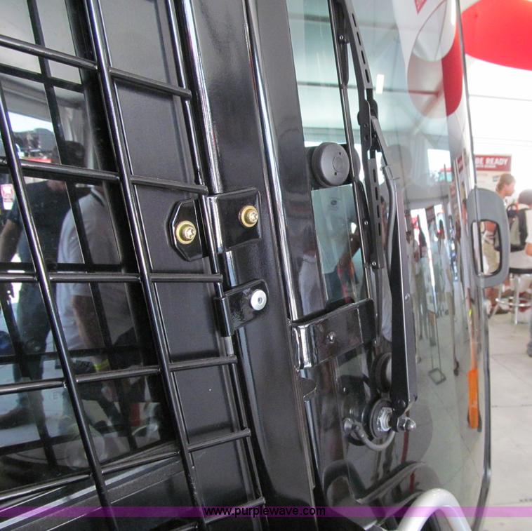 image for item B1474 2011 Case IH SV250 "RED POWER" skid steer