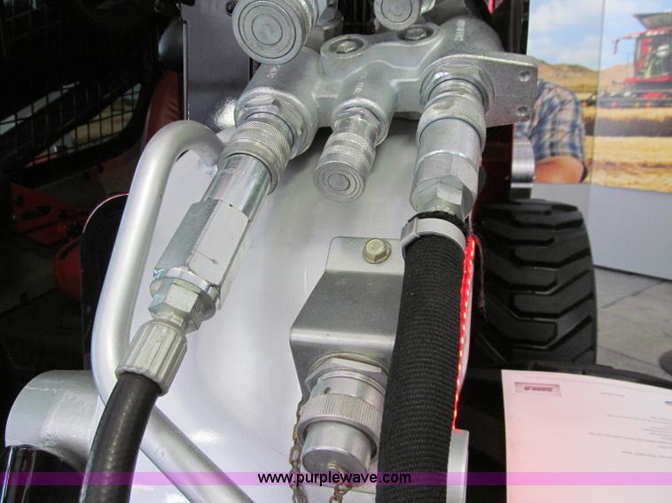 image for item B1474 2011 Case IH SV250 "RED POWER" skid steer