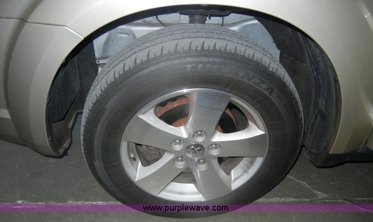 image for item D4884 2009 Dodge Journey SXT SUV <br />Non-repairable title, parts only