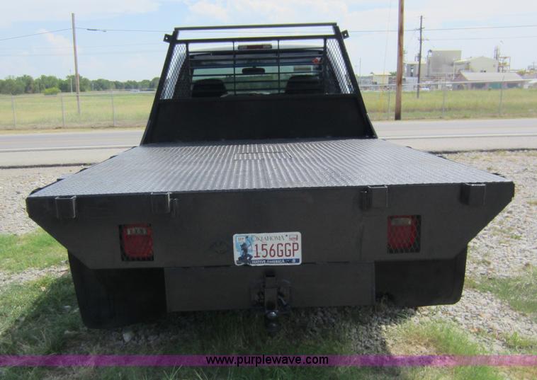 image for item D5600 1999 Chevrolet flatbed pickup truck