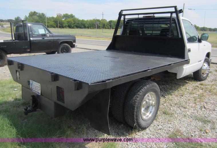 image for item D5600 1999 Chevrolet flatbed pickup truck