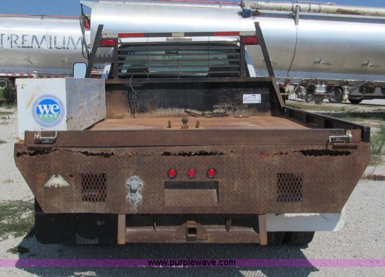 image for item E2102 1998 Dodge Ram 3500 Laramie SLT flatbed pickup truck