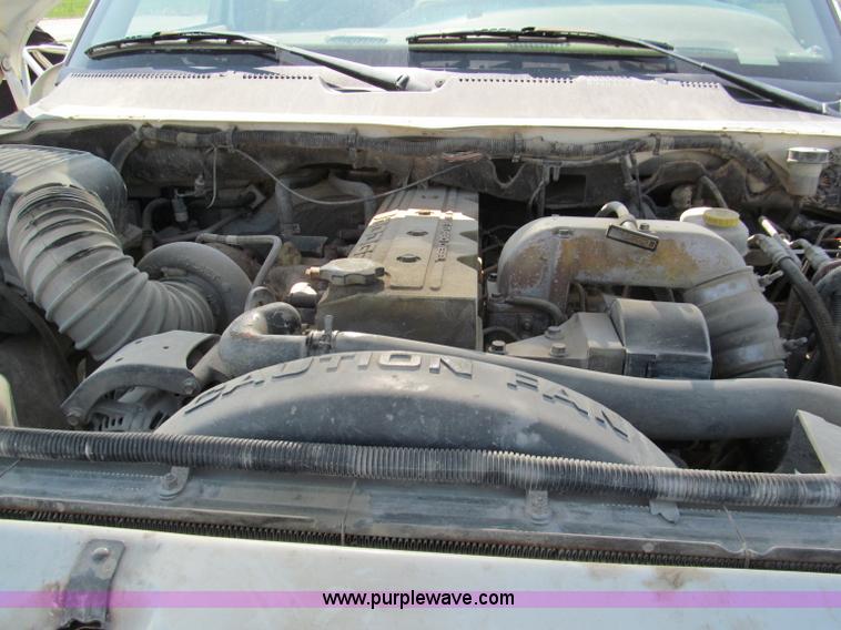 image for item E2102 1998 Dodge Ram 3500 Laramie SLT flatbed pickup truck