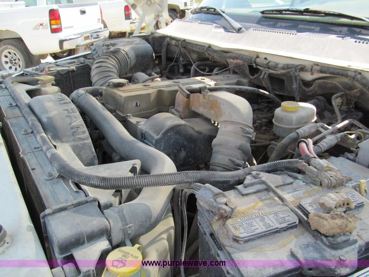 image for item E2102 1998 Dodge Ram 3500 Laramie SLT flatbed pickup truck