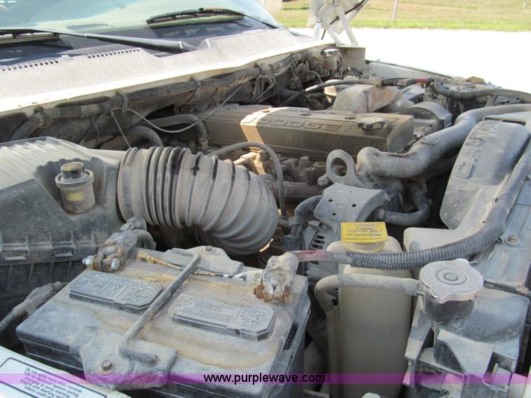 image for item E2102 1998 Dodge Ram 3500 Laramie SLT flatbed pickup truck