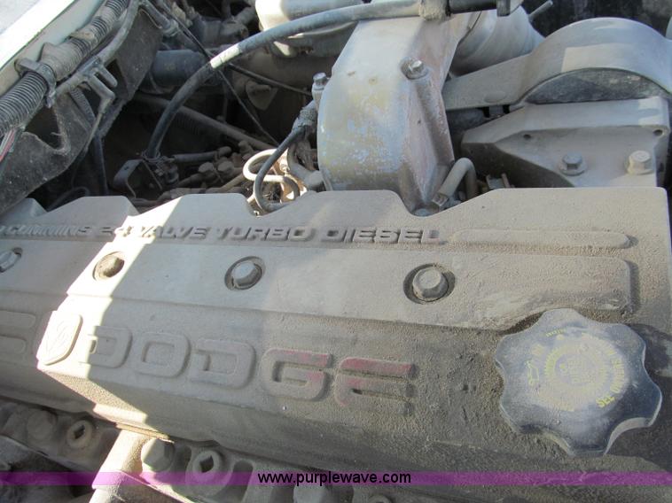 image for item E2102 1998 Dodge Ram 3500 Laramie SLT flatbed pickup truck