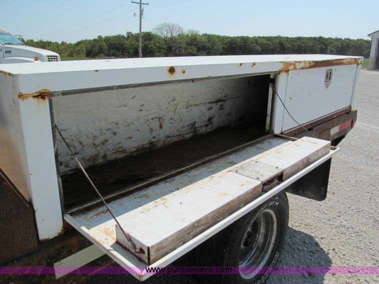 image for item E2102 1998 Dodge Ram 3500 Laramie SLT flatbed pickup truck