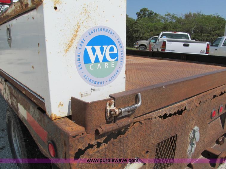 image for item E2102 1998 Dodge Ram 3500 Laramie SLT flatbed pickup truck